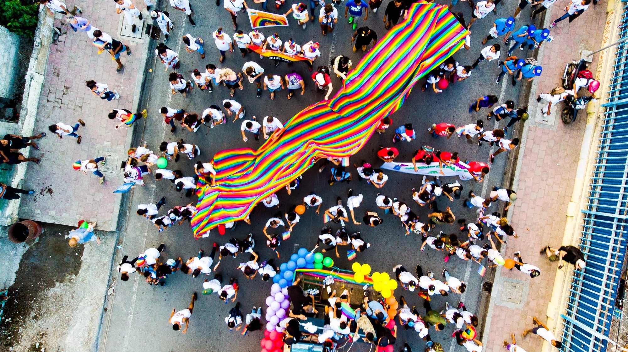 Pride Month : celebrate how far we've come and roll up our sleeves for the future