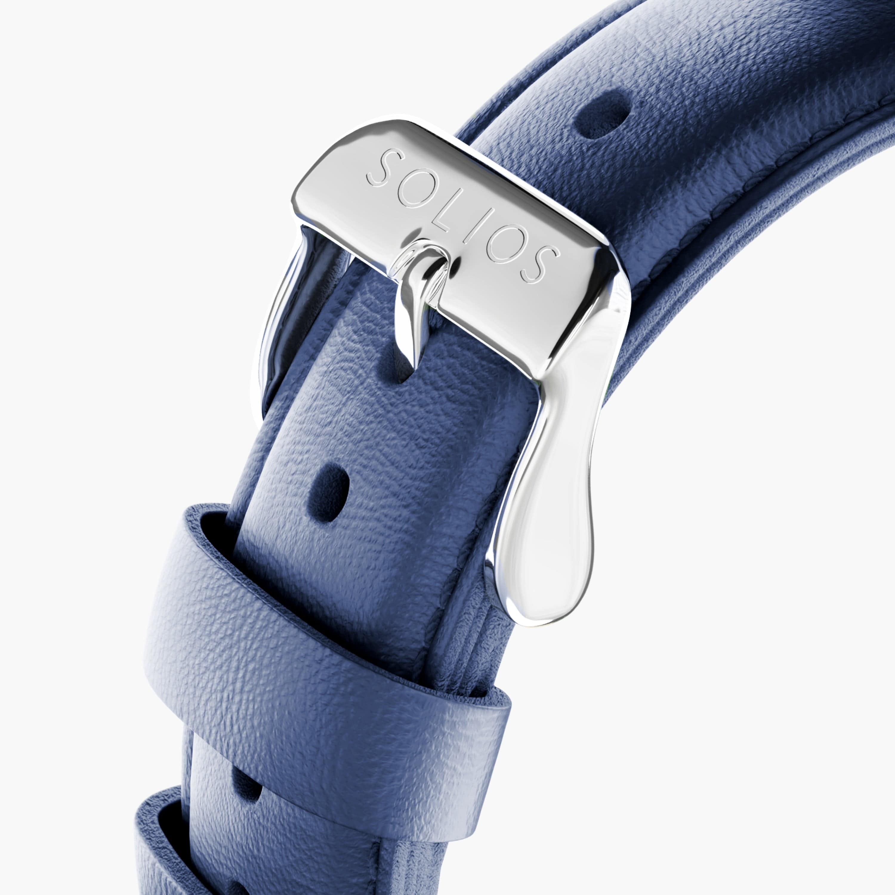 Close up view of the silver buckle from the blue eco vegan leather strap from Solios.