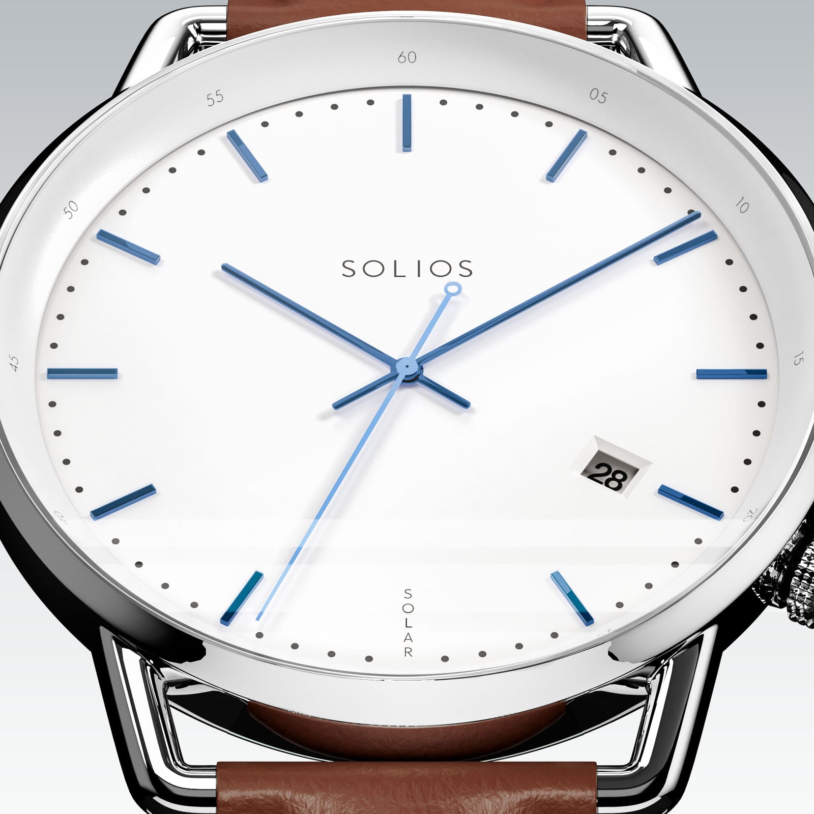 Close-up of the Solios Solar Curve white dial with blue hands, date and SOLAR text, brown vegan leather strap