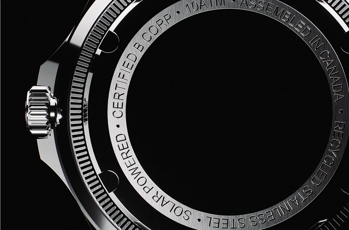 Solios recycled stainless-steel caseback engraved 'Certified B Corp, assembled in Canada, solar powered'