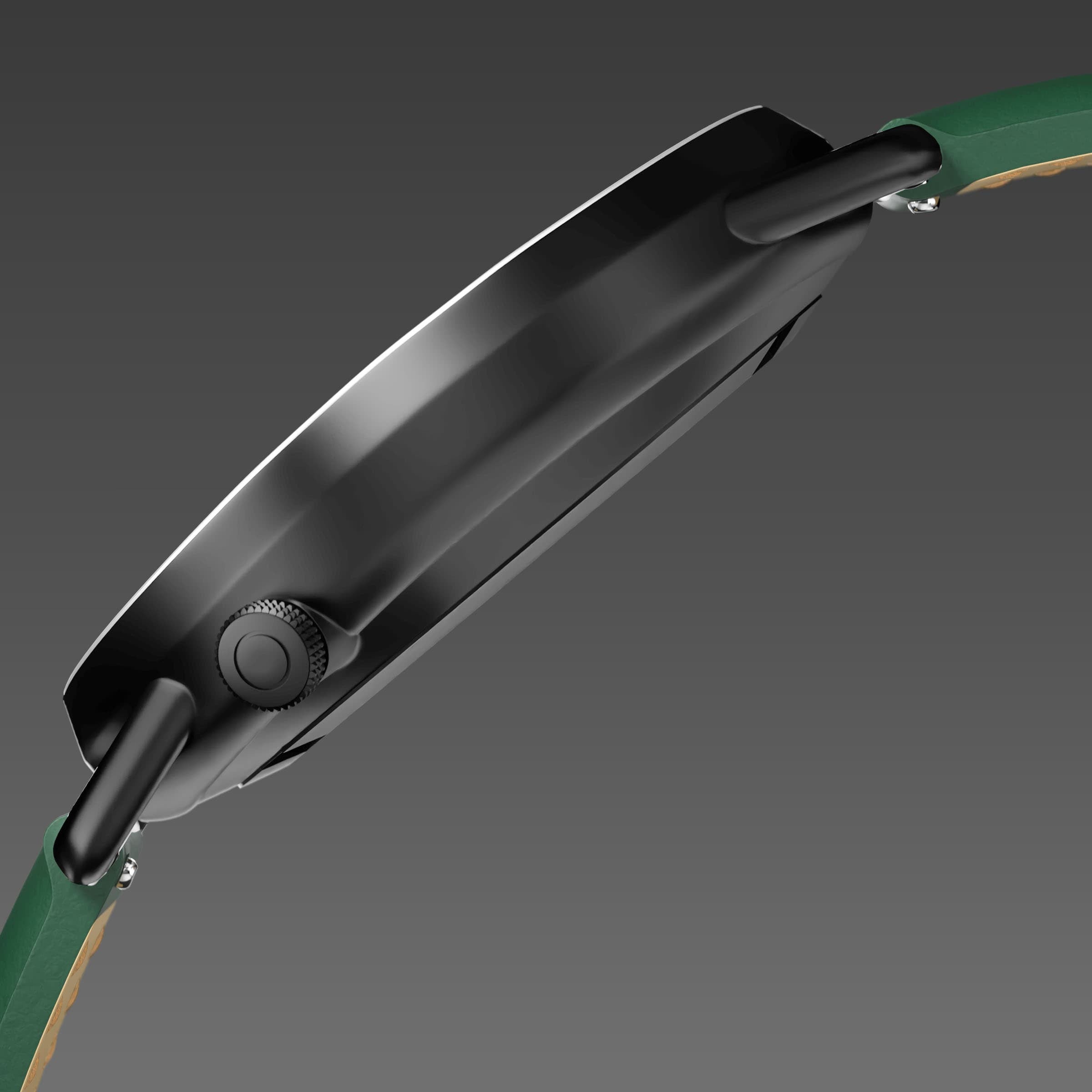 Side profile of the Solios Solar Curve, black dial and mat black case, showing its curved sapphire crystal and crown, green vegan leather strap