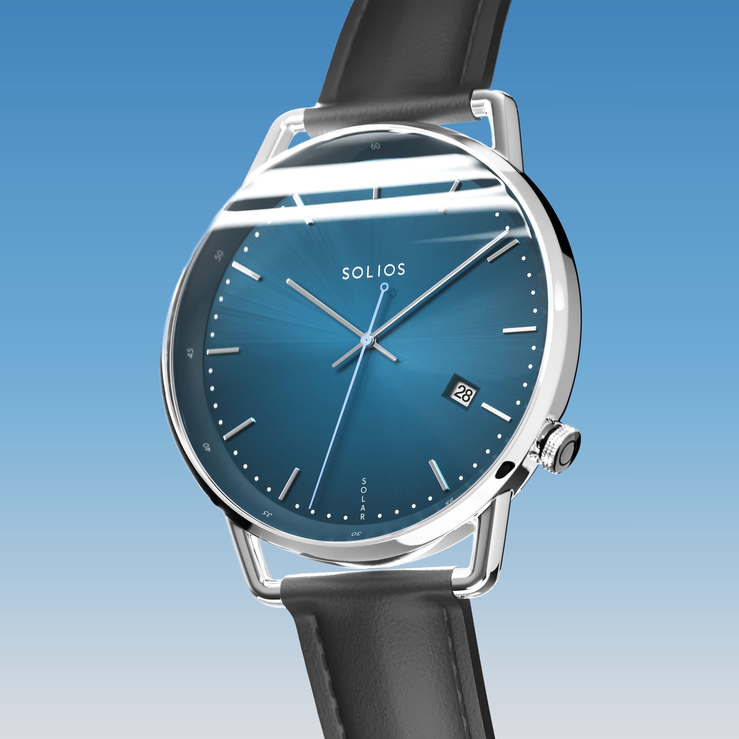 Solios Solar Curve, blue dial and silver case, at a three-quarter angle, silver hands and indices, date calendar, curved sapphire crystal, black vegan leather strap