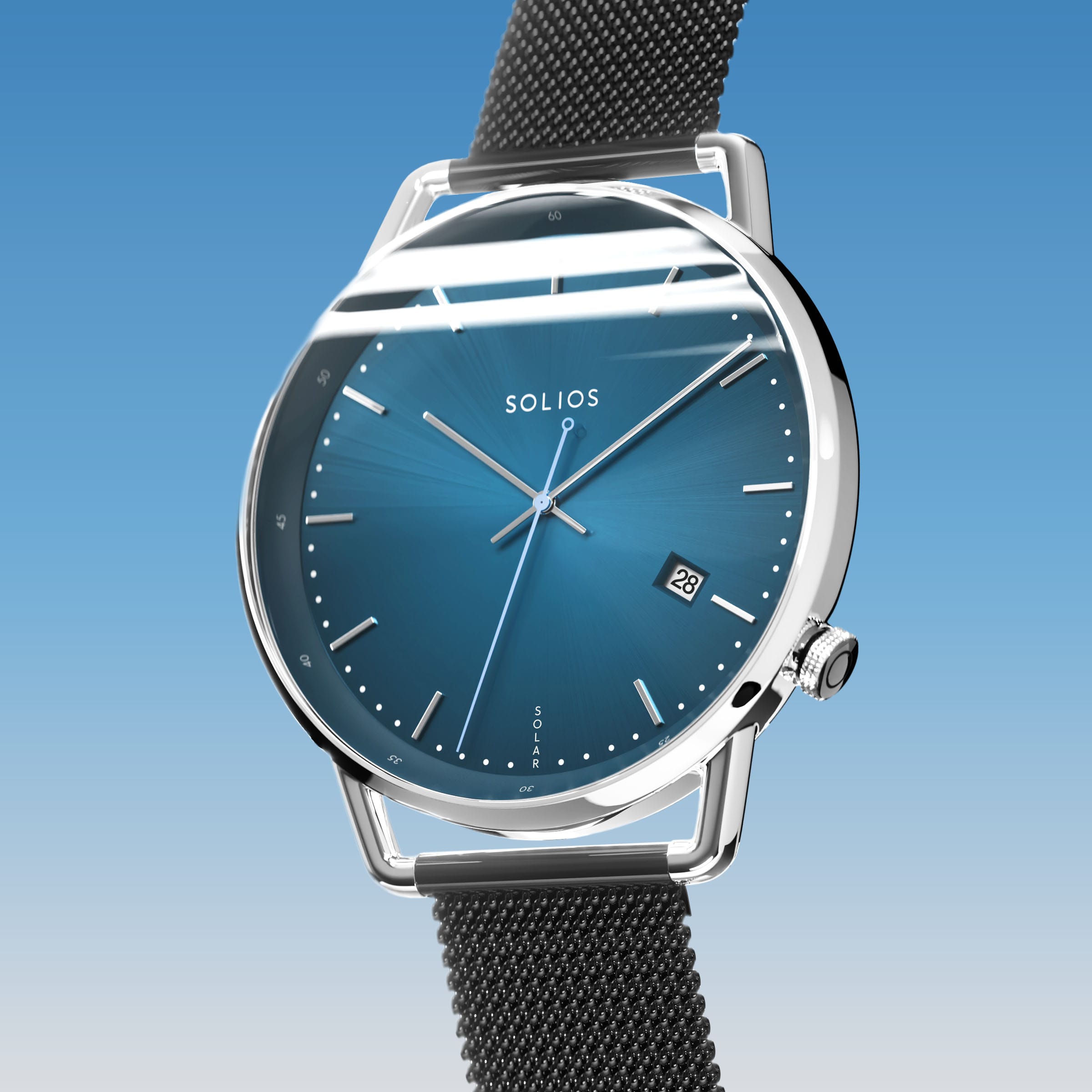 Solios Solar Curve, blue dial and silver case, at a three-quarter angle, silver hands and indices, date calendar, curved sapphire crystal, black mesh metal strap