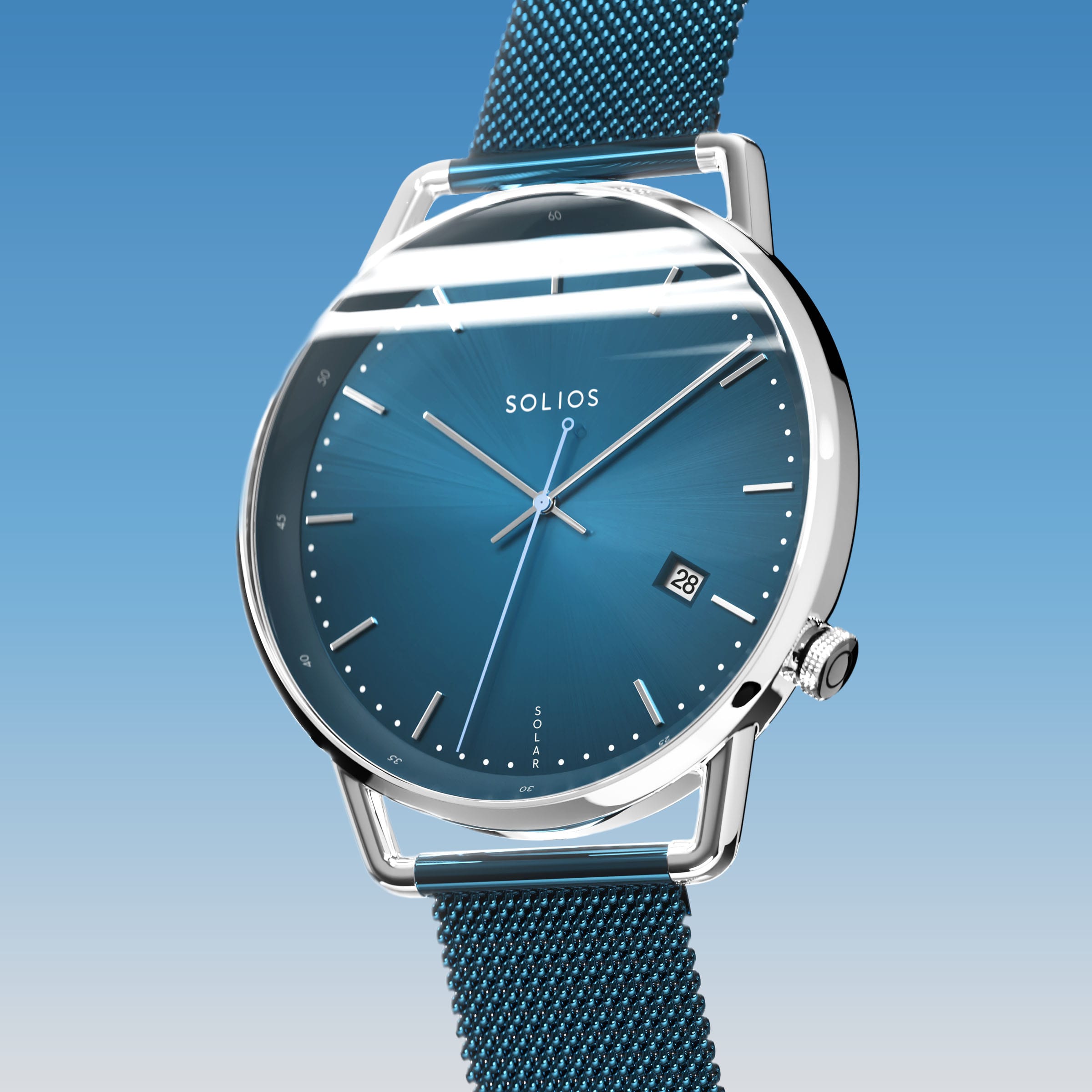 Solios Solar Curve, blue dial and silver case, at a three-quarter angle, silver hands and indices, date calendar, curved sapphire crystal, blue mesh metal strap