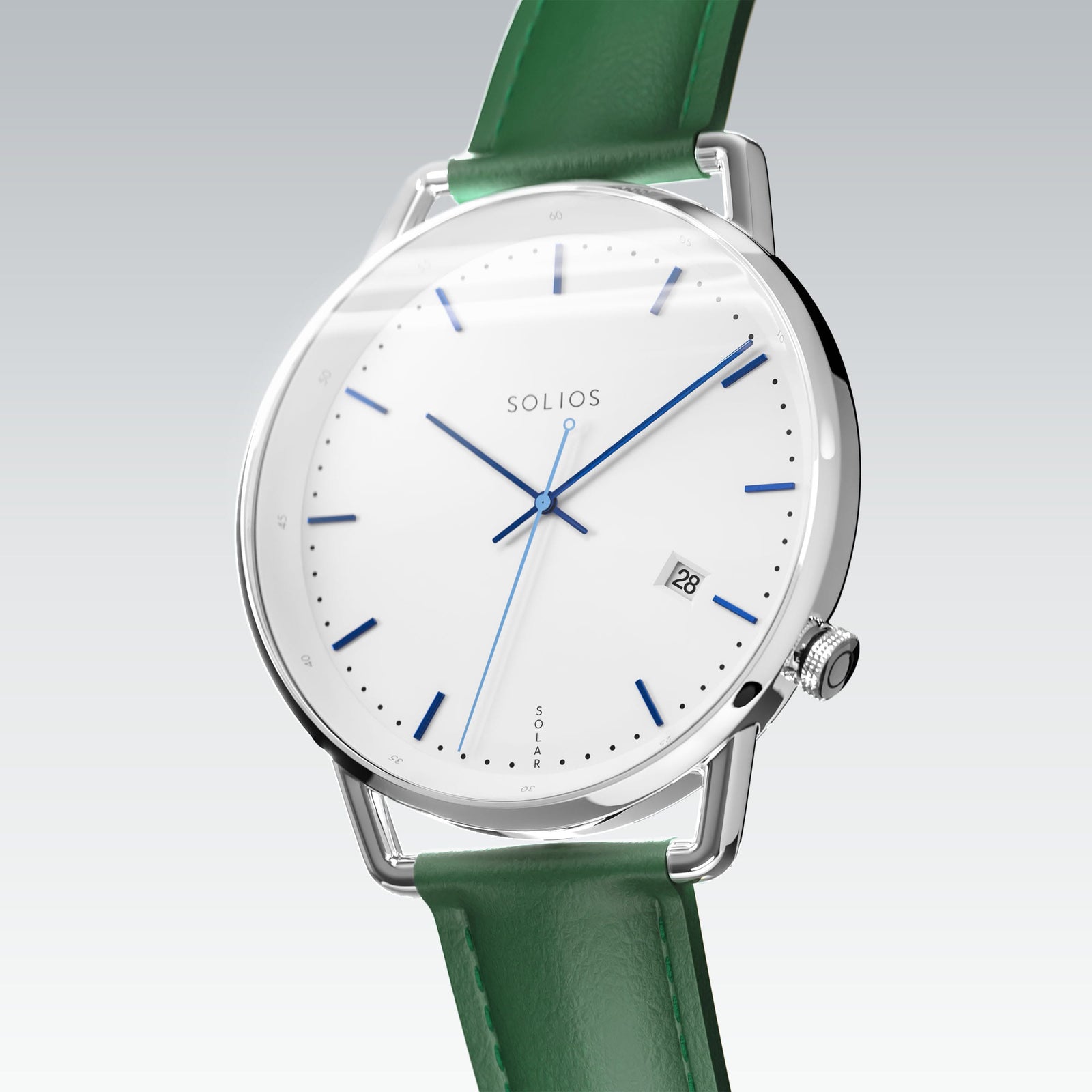 Solios Solar Curve, white dial and silver case, at a three-quarter angle, blue hands and indices, date calendar, curved sapphire crystal, green vegan leather strap