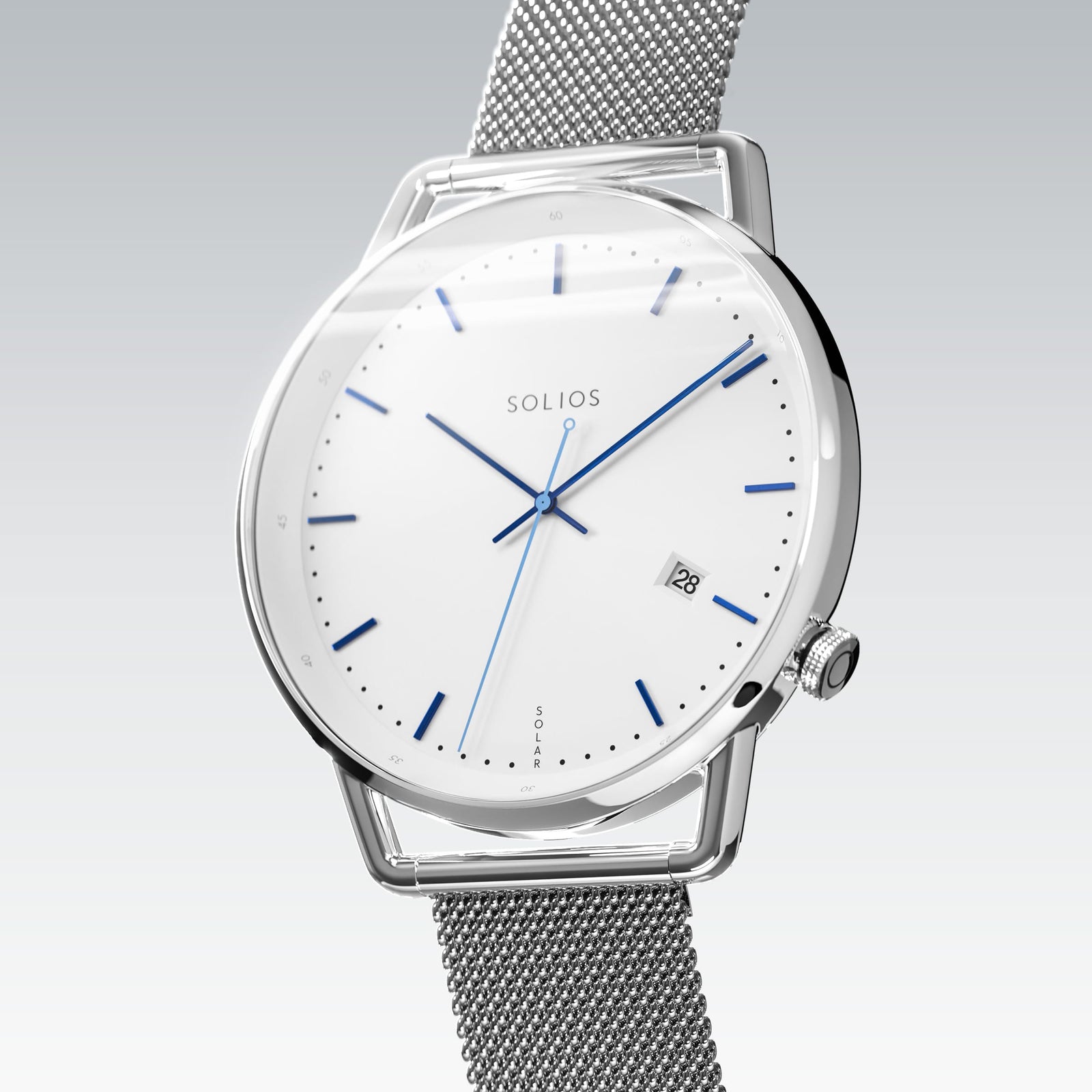 Solios Solar Curve, white dial and silver case, at a three-quarter angle, blue hands and indices, date calendar, curved sapphire crystal, silver stainless steel mesh strap.