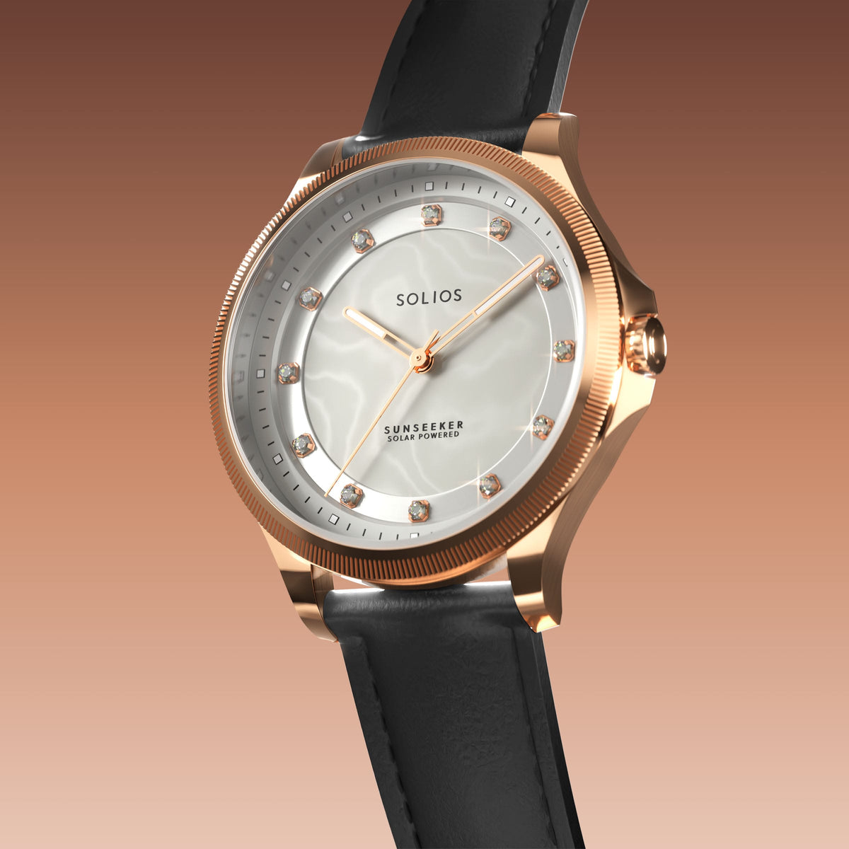 Angled view of the Sunseeker 34mm solar watch, mother of pearl dial with crystal hour markers and rose gold case on a black eco vegan leather strap