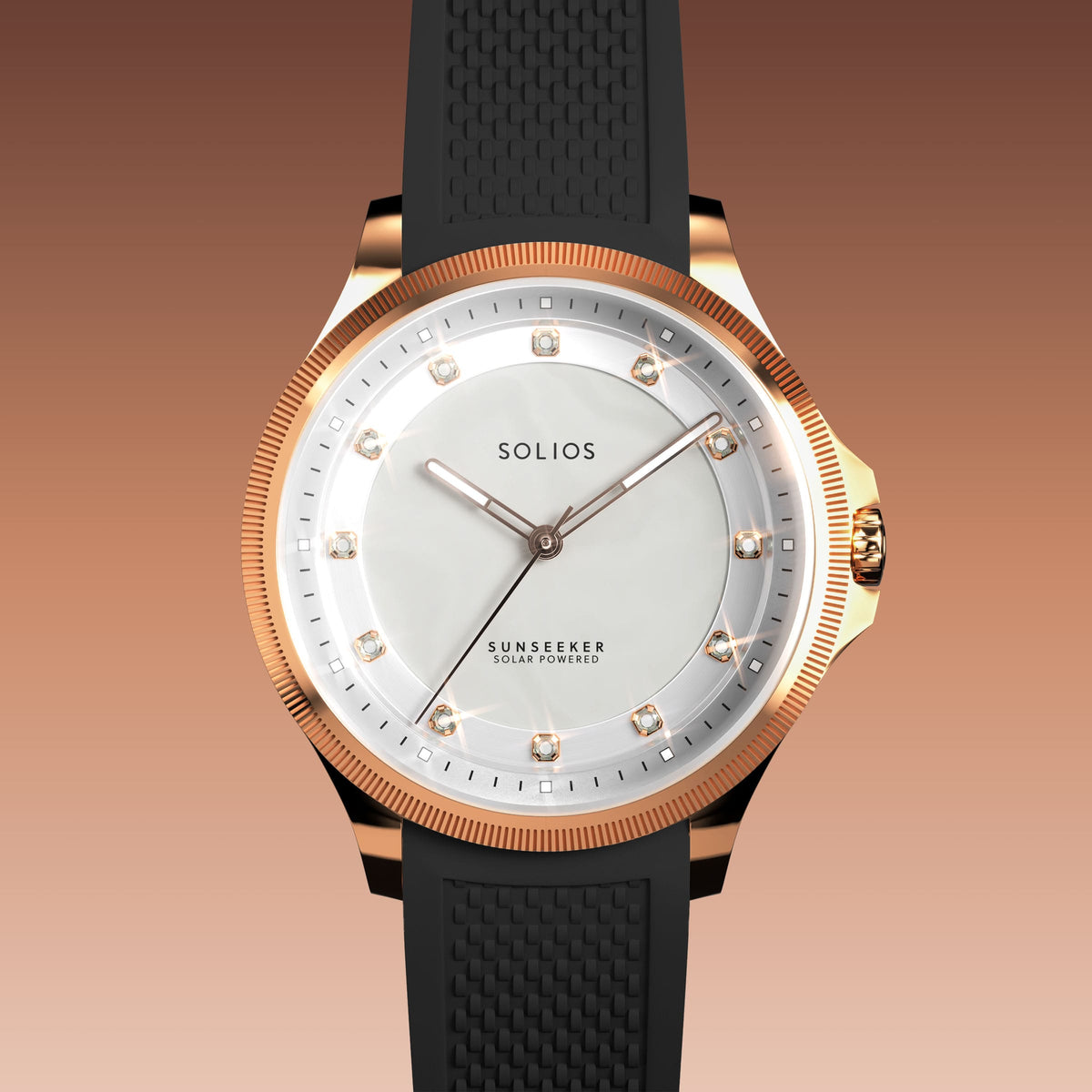 Close front view of the Sunseeker 34mm mother of pearl dial with crystal hour markers and rose gold case on a black natural rubber strap