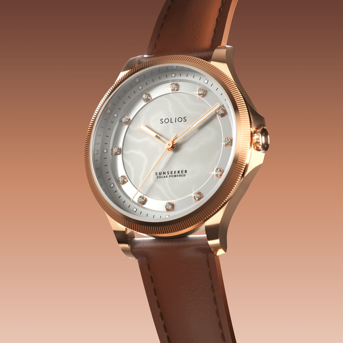 Angled view of the Sunseeker 34mm solar watch, mother of pearl dial with crystal hour markers and rose gold case on a brown eco vegan leather strap