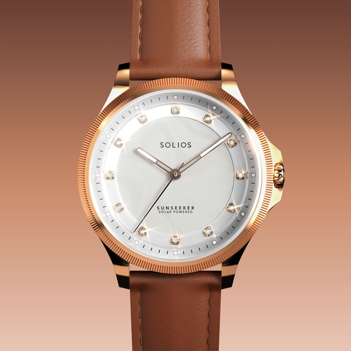 Close front view of the Sunseeker 34mm mother of pearl dial with crystal hour markers and rose gold case on a brown eco vegan leather strap