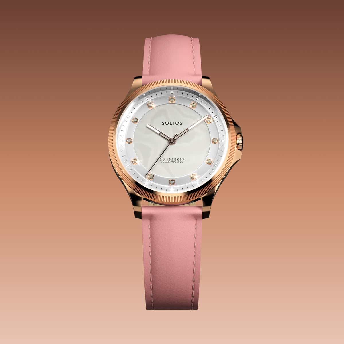 The Sunseeker 34mm solar watch from Solios, front view, mother of pearl dial with crystal hour markers in a rose gold case on a pink eco vegan leather strap