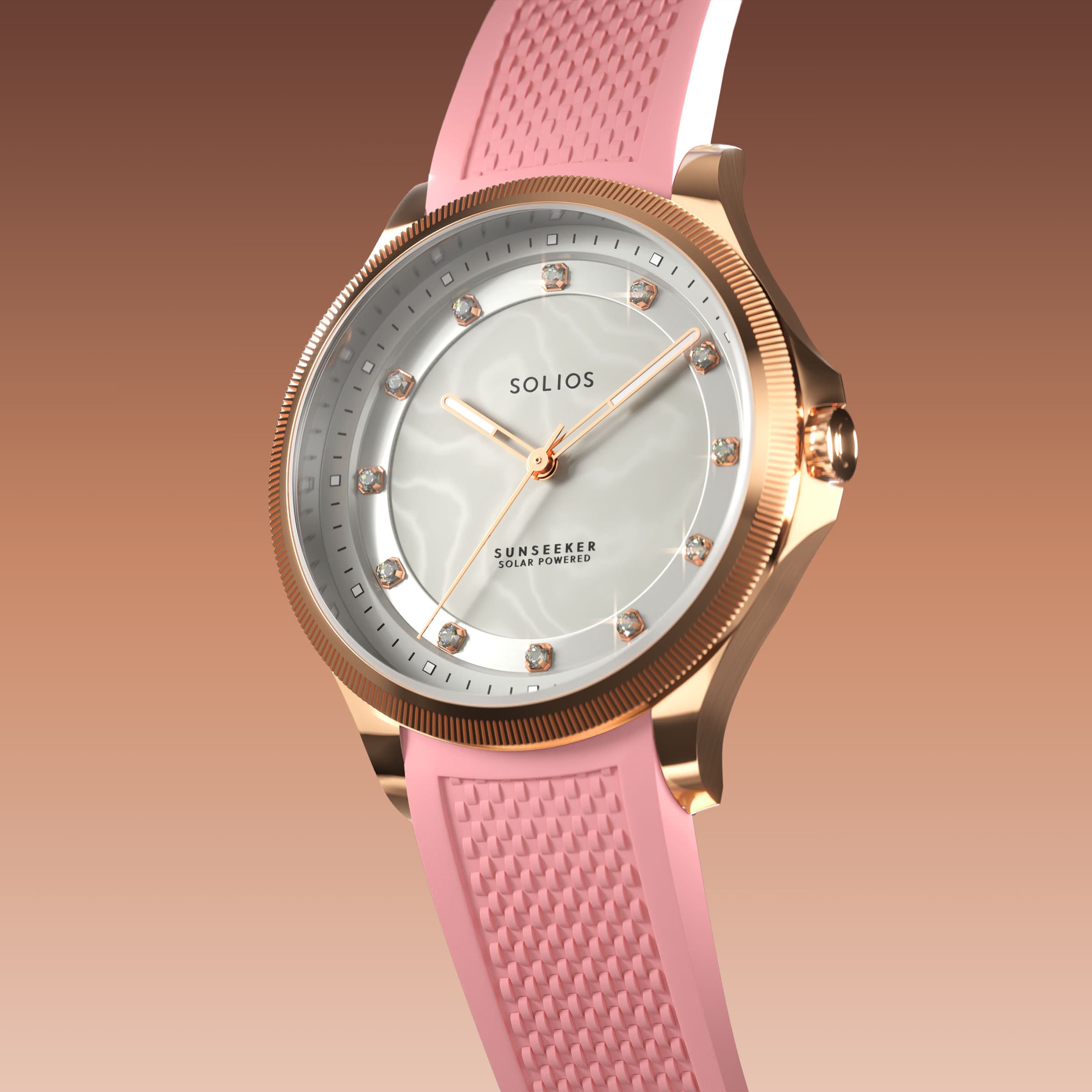 Angled view of the Sunseeker 34mm solar watch, mother of pearl dial with crystal hour markers and rose gold case on a pink natural rubber strap