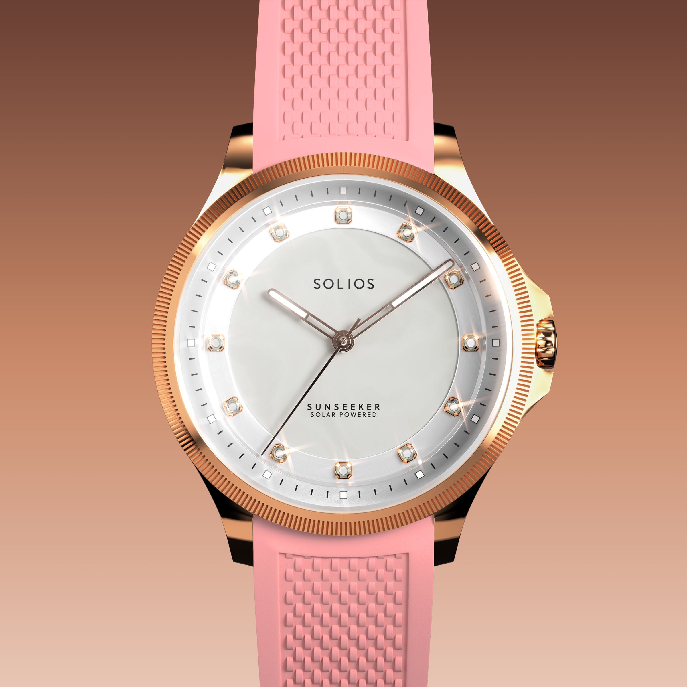 Close front view of the Sunseeker 34mm mother of pearl dial with crystal hour markers and rose gold case on a pink natural rubber strap
