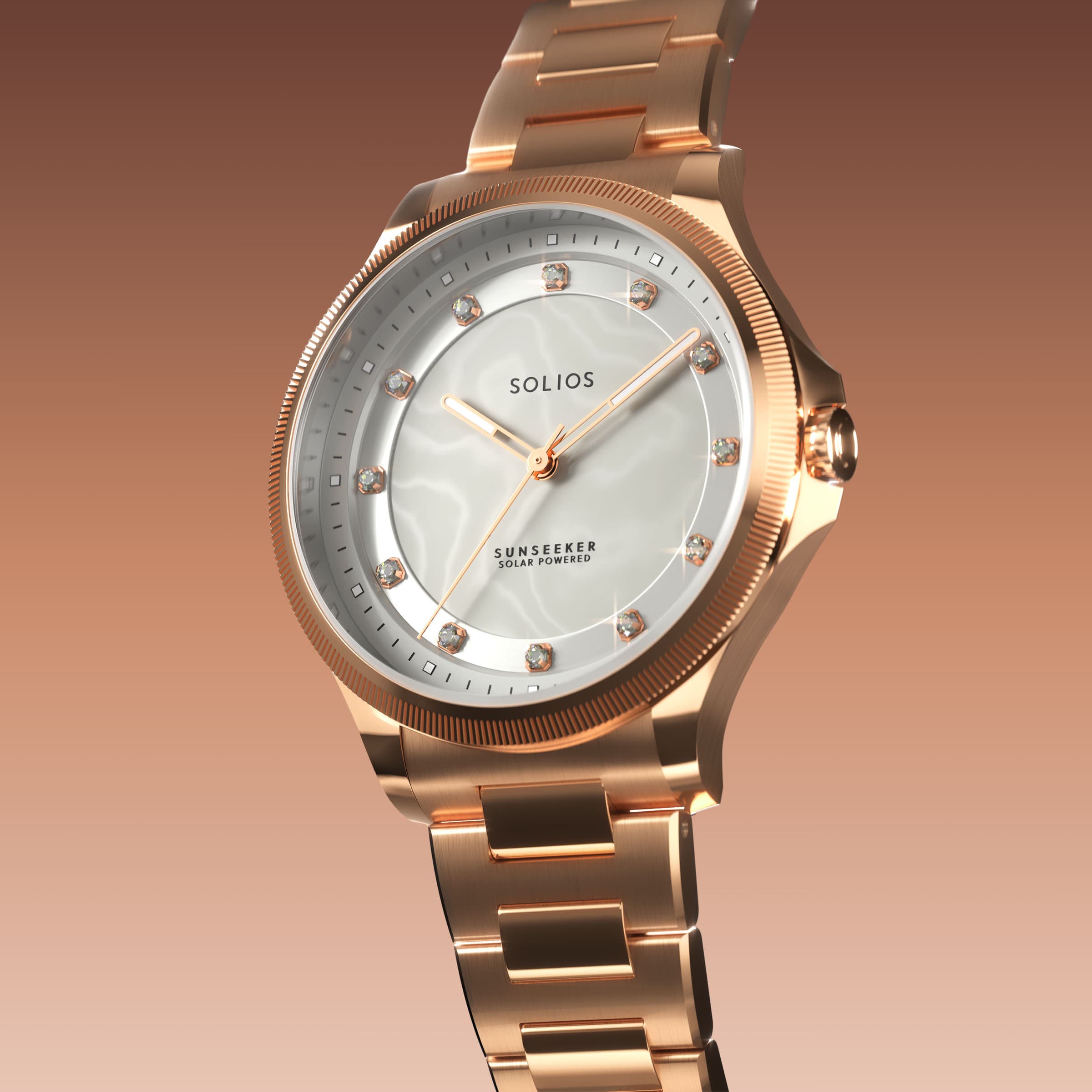 Angled view of the Sunseeker 34mm solar watch, mother of pearl dial with crystal hour markers and rose gold case on a rose gold metal link bracelet