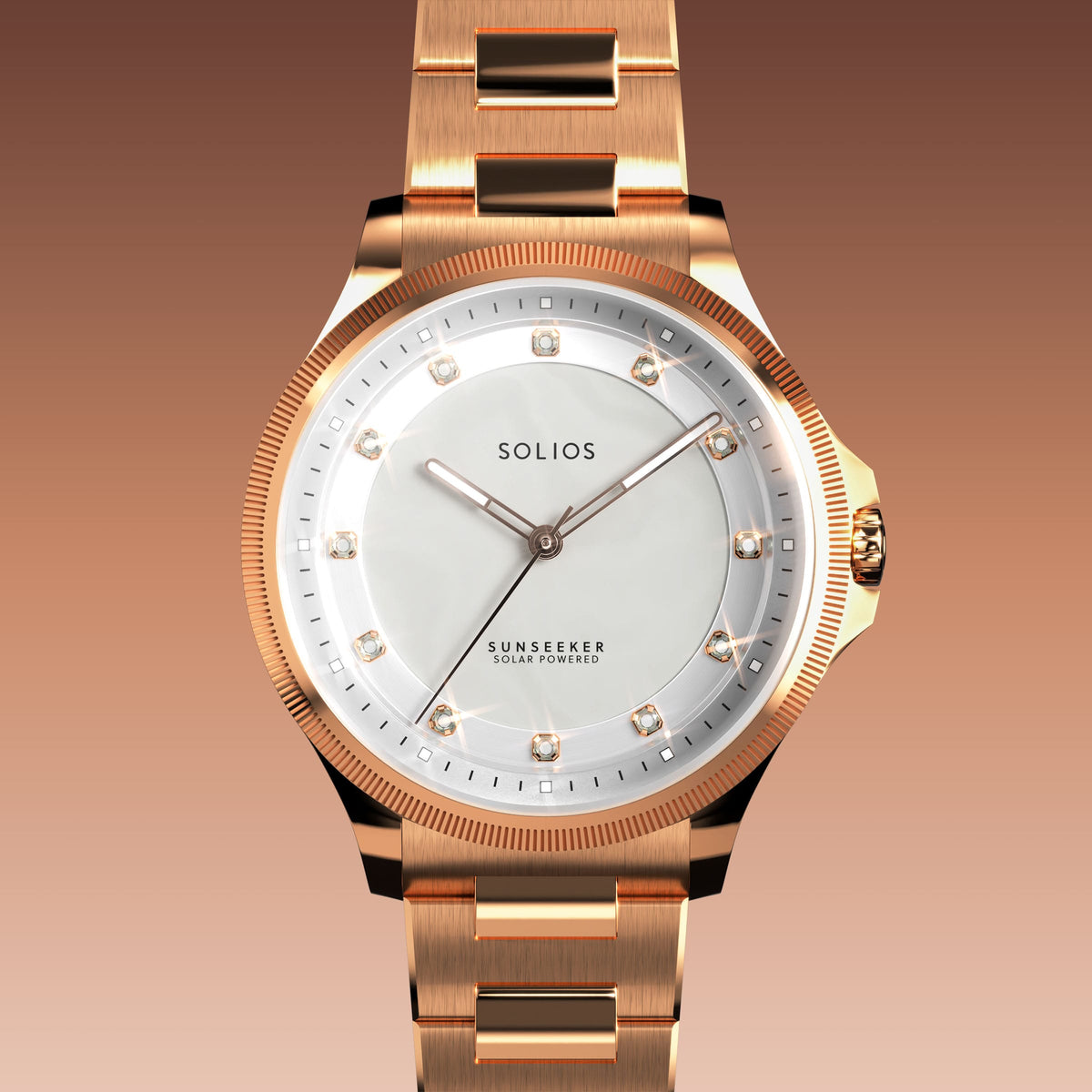 Close front view of the Sunseeker 34mm mother of pearl dial with crystal hour markers and rose gold case on a rose gold metal link bracelet