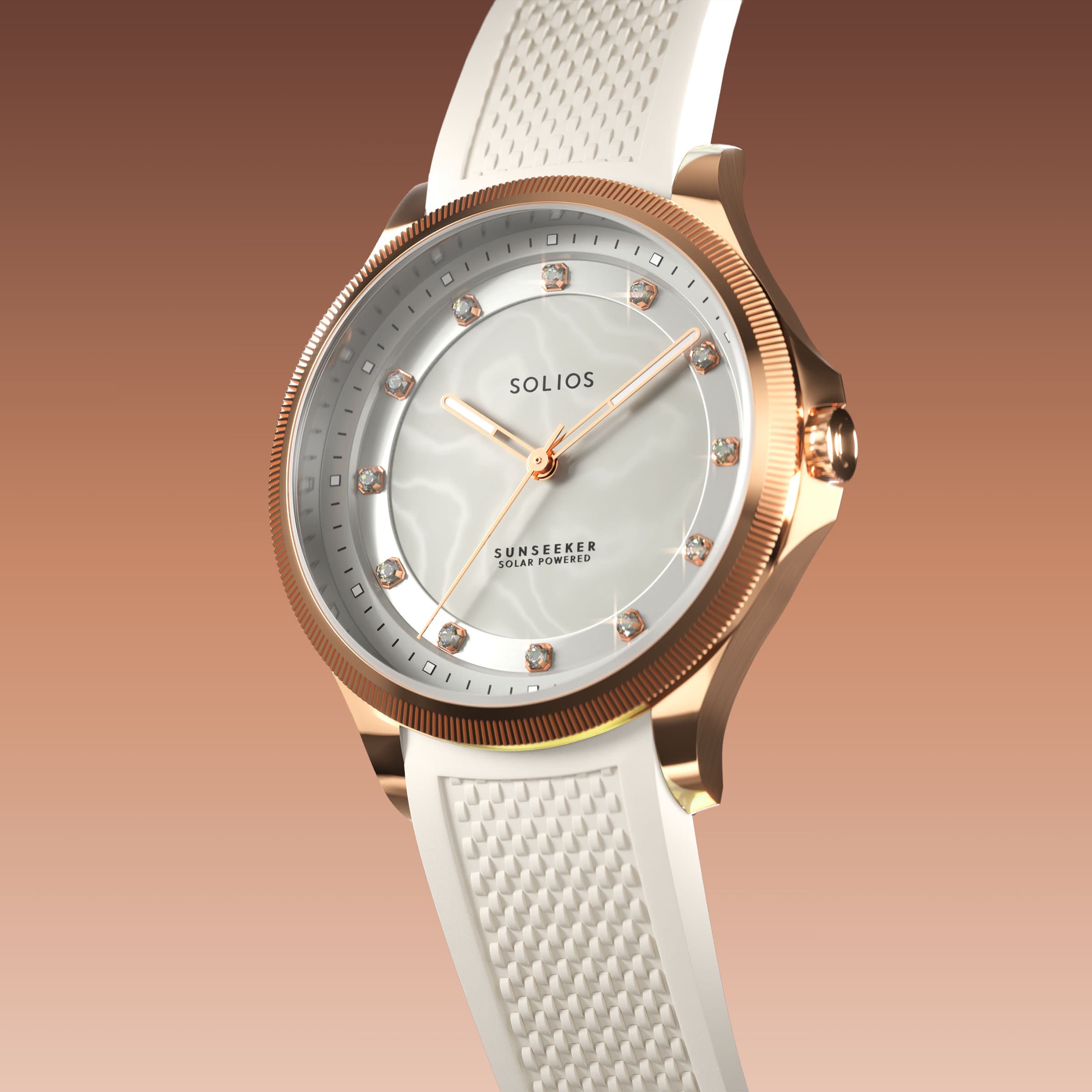 Angled view of the Sunseeker 34mm solar watch, mother of pearl dial with crystal hour markers and rose gold case on a white natural rubber strap