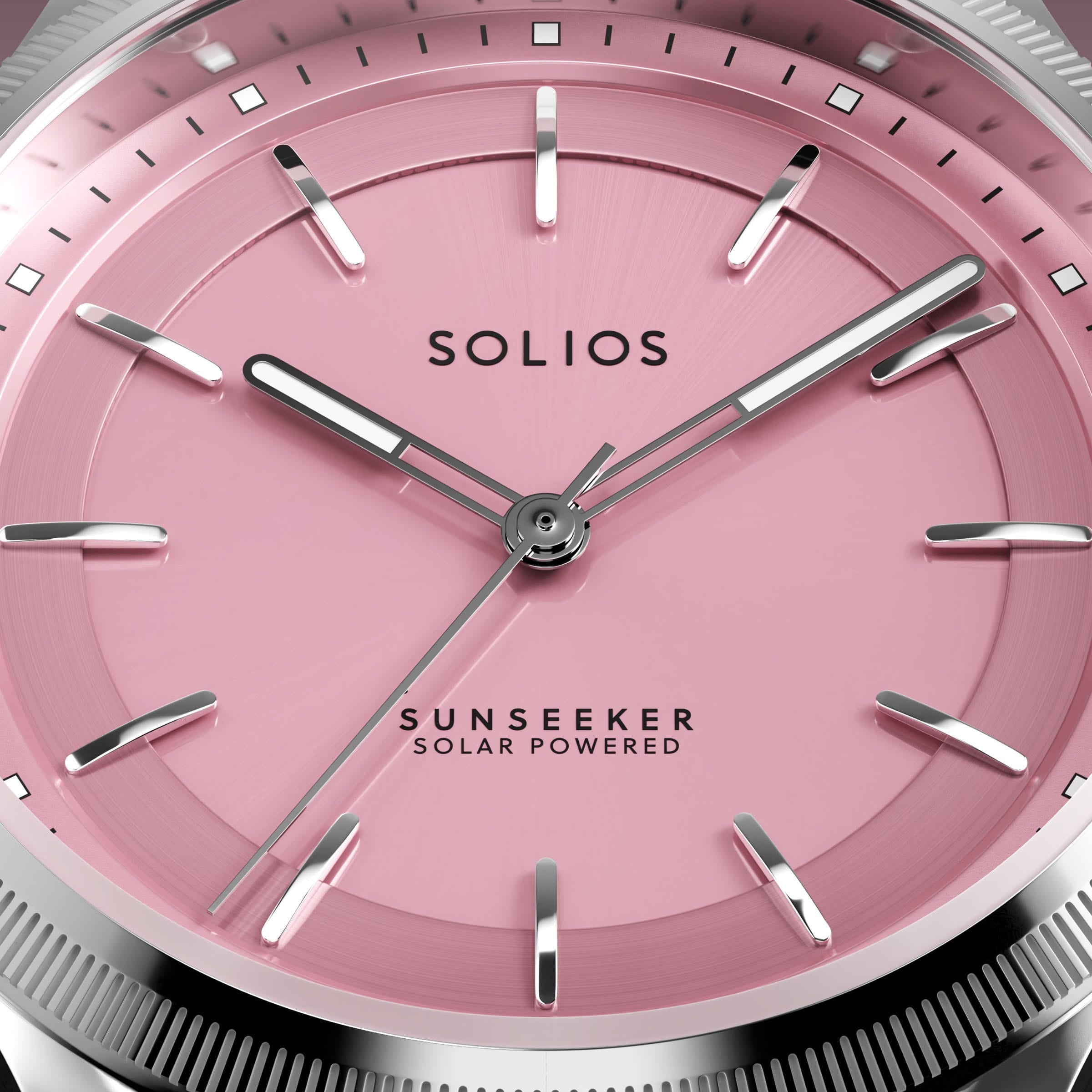 Macro of the Solios Sunseeker pink dial with luminous floating indices and ray-cut bezel edge