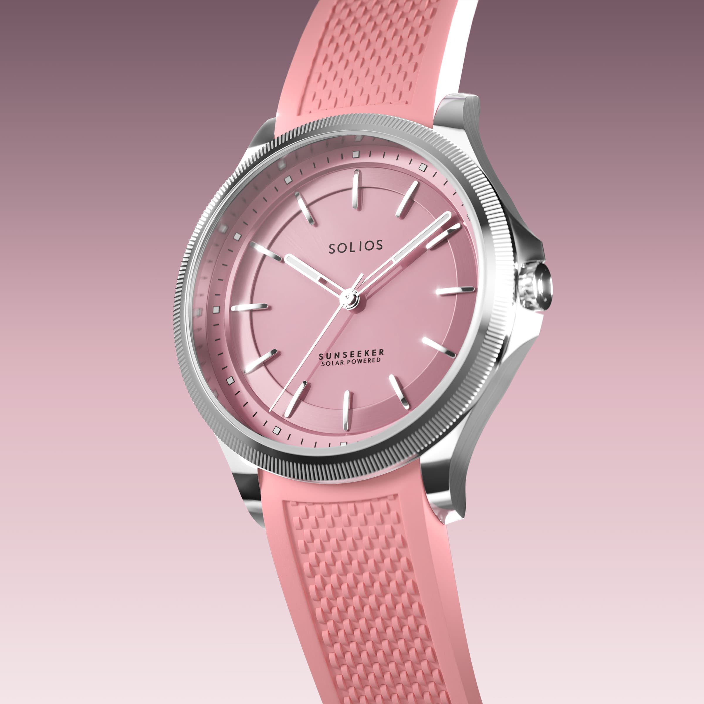Angled view of the Sunseeker 34mm solar watch, pink dial and silver case on a pink natural rubber strap