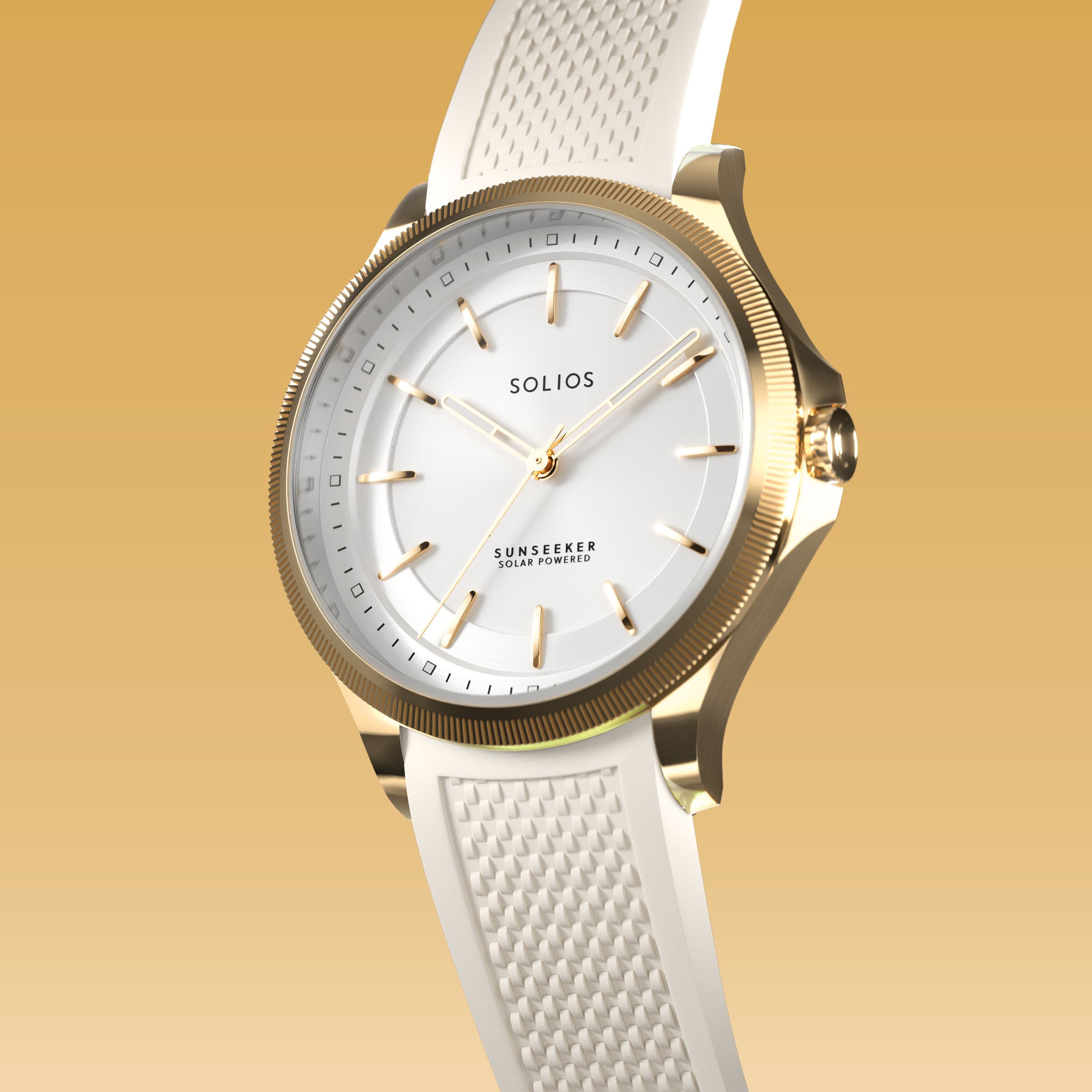 Angled view of the Sunseeker 34mm solar watch, white dial and gold case on a white natural rubber strap