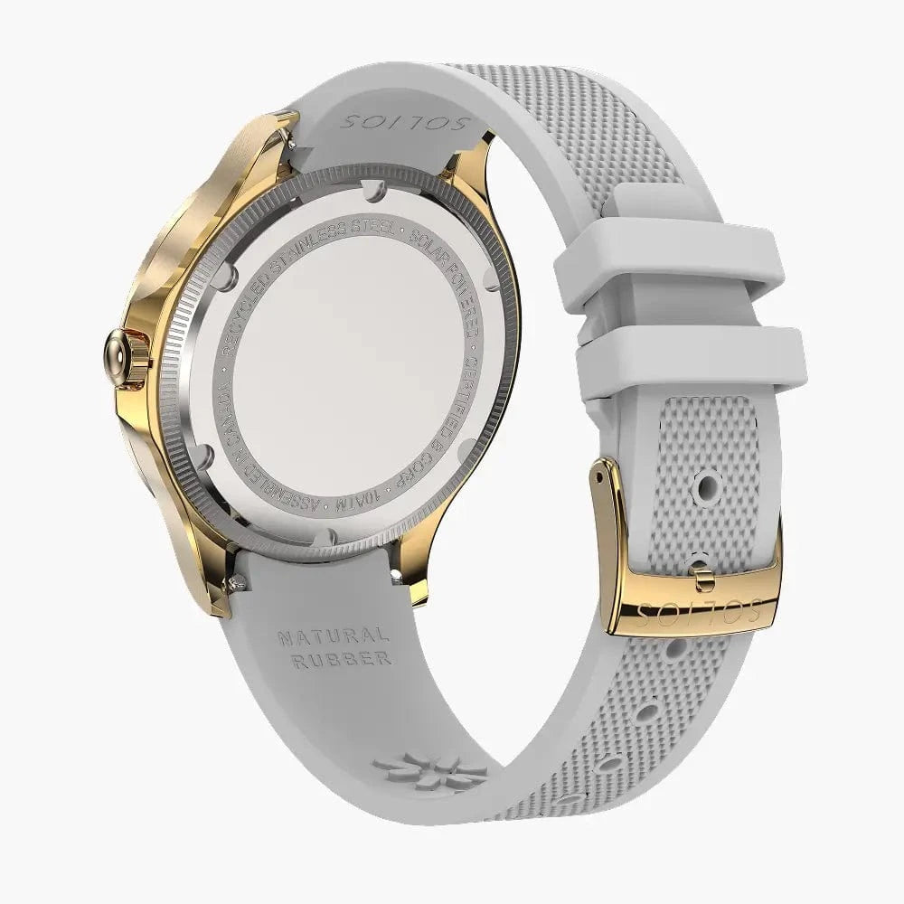 White natural rubber strap attached to a Sunseeker Solios solar watch with a gold case and strap buckle