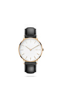 Solios solar watch with a white dial and rose gold case on a black leather strap